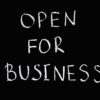 Text Open for Business in white on black background